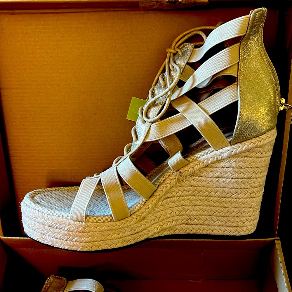 Brand new gold and cream wedges. Size 10 Never worn.